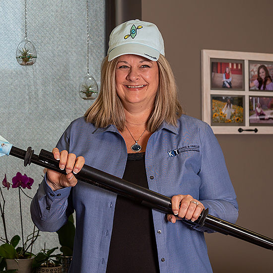 Michelle Young with kayak paddles