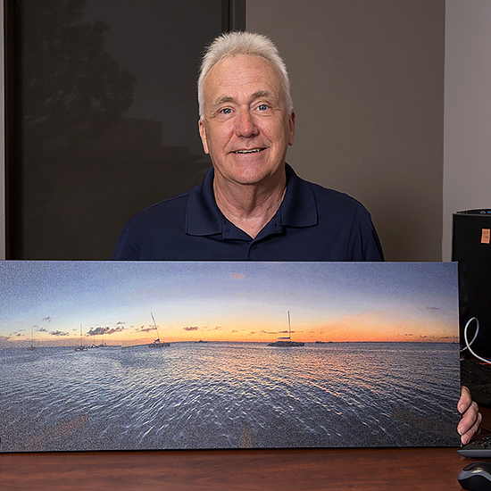 Jeffrey Bane with photograph of ocean