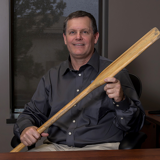 Hans Distlehorst holding and oar