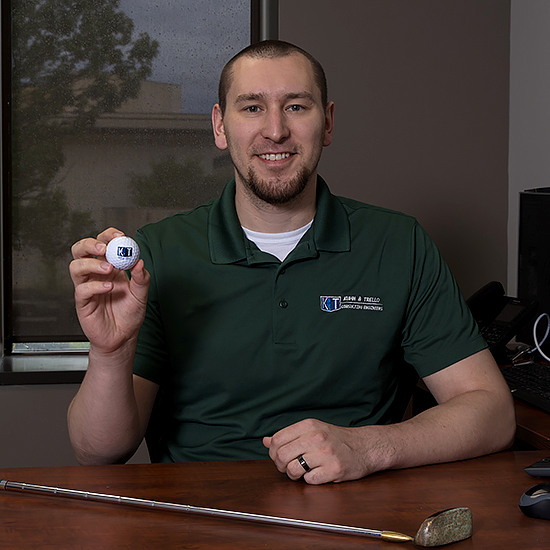 Matthew Zinnecker with golf ball and club